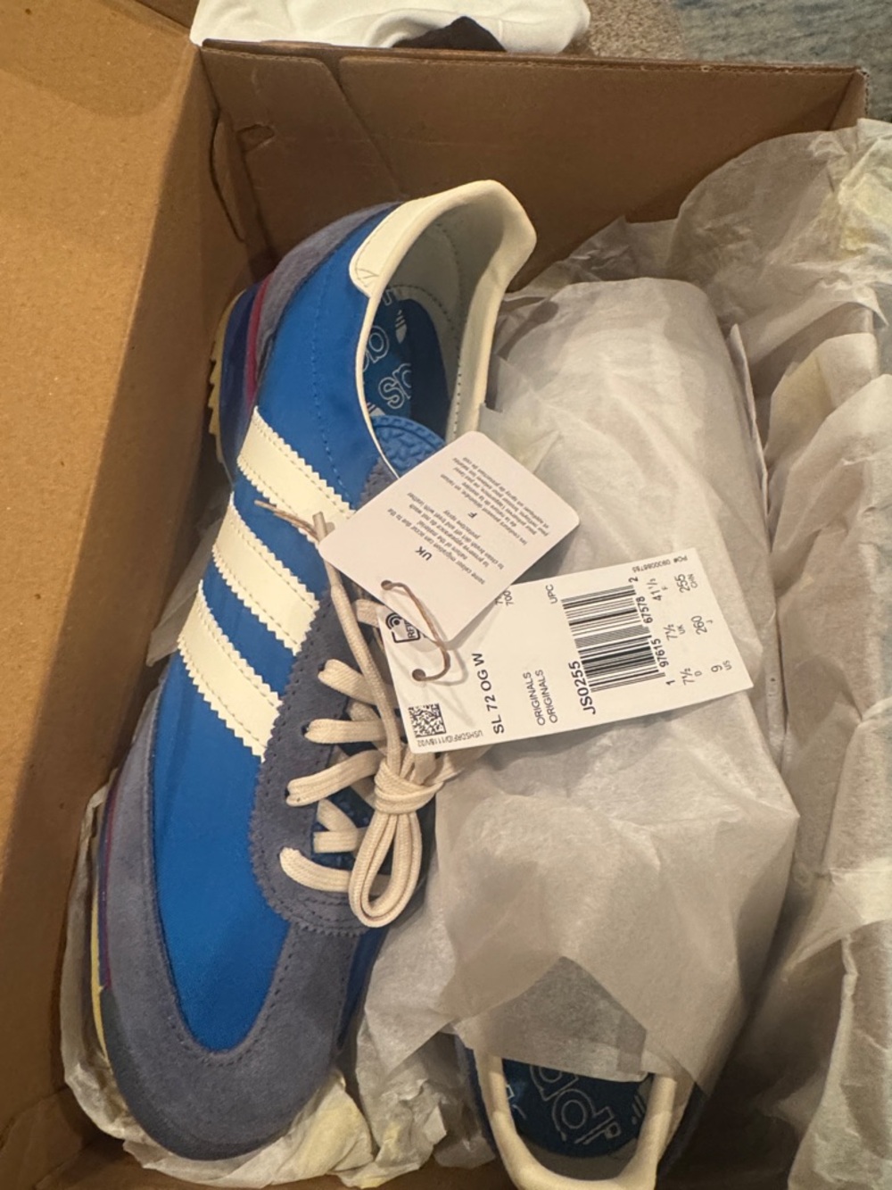 New with tags adidas Blue and White Retro Runner with Gray Suede Trim size 9.